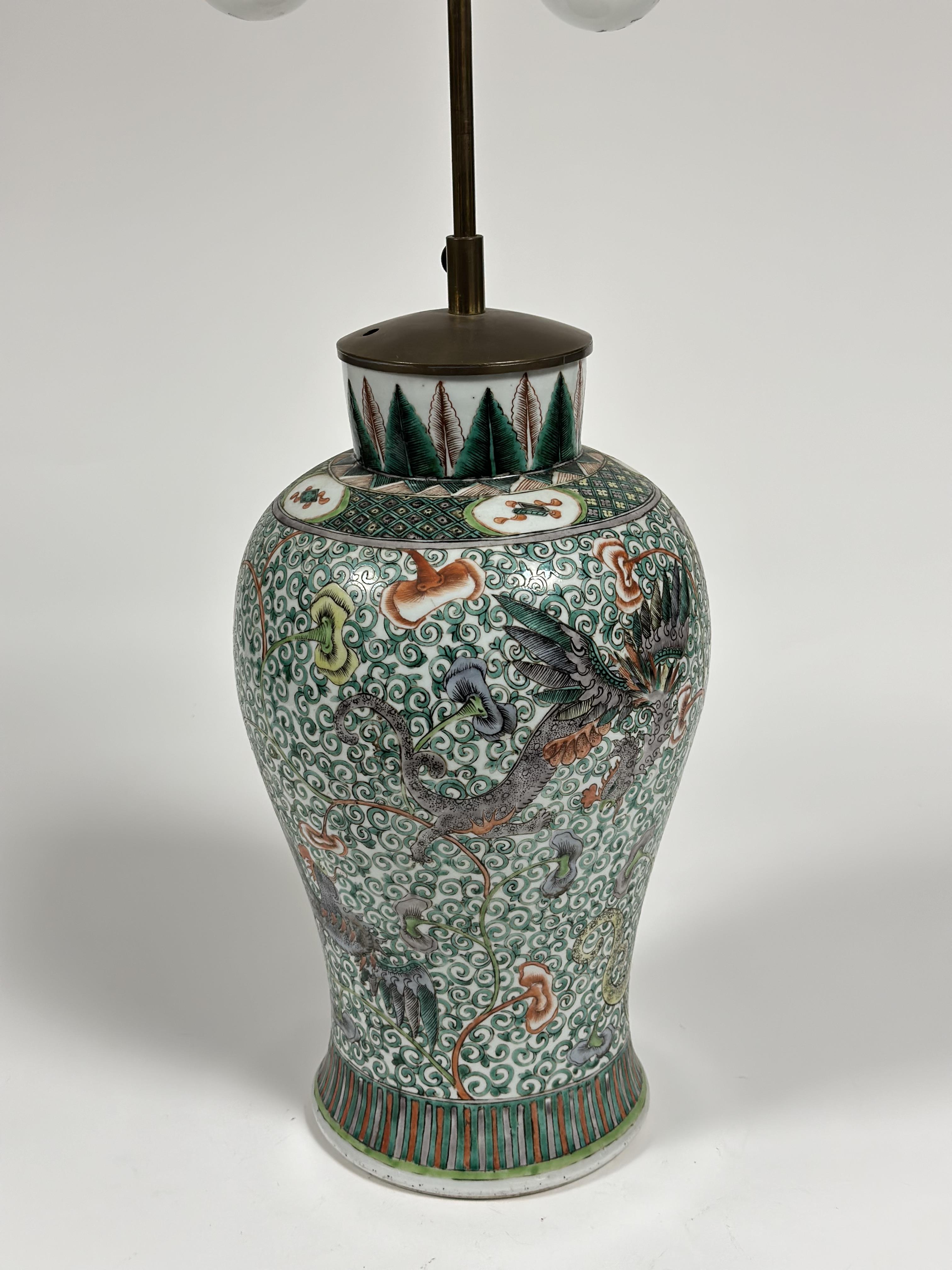 A Chinese famille verte porcelain vase of baluster form, mounted as a table lamp, decorated with