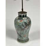 A Chinese famille verte porcelain vase of baluster form, mounted as a table lamp, decorated with