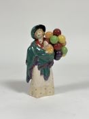 An early Royal Doulton figure of "The Balloon Seller", HN563 (no damage or restoration to the