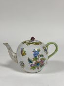 A large Herend teapot in the Queen Victoria pattern, with ozier-moulded borders and floral knop,