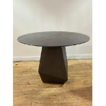 Julian Chichester, a contemporary centre table, the circular ebonised oak top with a chamfered