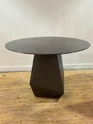 Julian Chichester, a contemporary centre table, the circular ebonised oak top with a chamfered