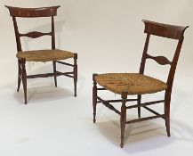 A pair of Victorian mahogany apprentice chairs, the bowed and shaped crest rail over shaped rail