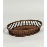 A satinwood-inlaid mahogany bread basket, of Georgian design, early 20th century, oval, the base