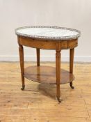 A walnut bouillotte table in the Louis XVI taste, late 19th century, the oval top with