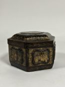 A Chinese Export black and gilt lacquer tea caddy, 19th century, of hexagonal form, the hinged cover