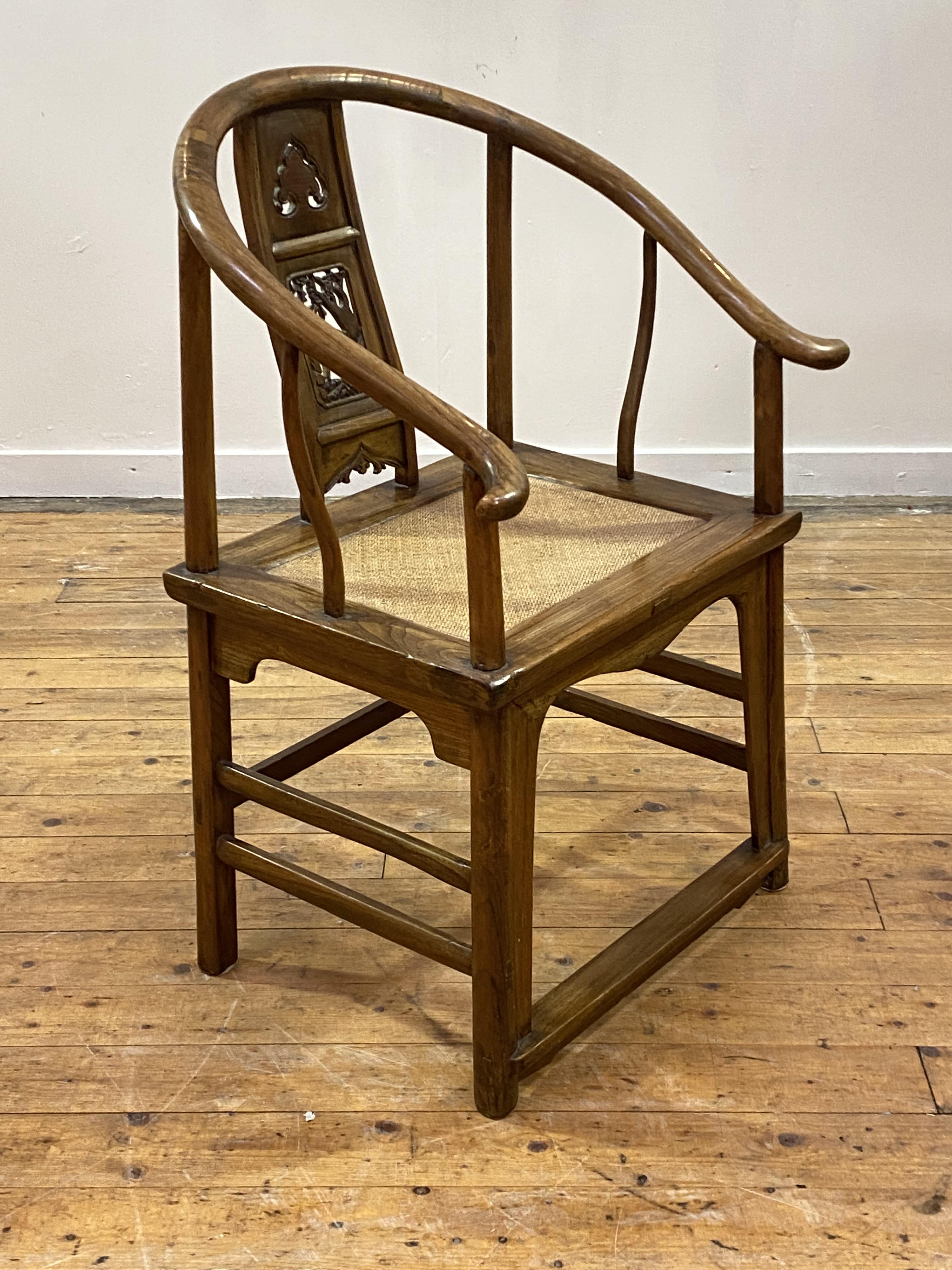 A Chinese elm horseshoe back chair, late 19th/ early 20th century, the sweeping crest rail with - Image 2 of 6