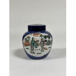 A Chinese famille rose porcelain jar and cover, painted with figural and floral cartouches against a