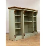 A Victorian painted oak dwarf breakfront bookcase, the faux marble top over plain frieze and four