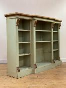 A Victorian painted oak dwarf breakfront bookcase, the faux marble top over plain frieze and four