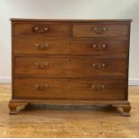 A George III mahogany chest of drawers, the rectangular top with moulded edge over two short and
