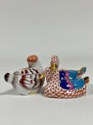 A Herend group of two ducks, in the red fishnet pattern; together with a Herend miniature bird