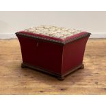 A Victorian mahogany framed ottoman, the needlework upholstered top worked in a floral design with