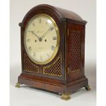 A Regency bracket clock by Mitchelson of London, the domed mahogany case with brass fish scale