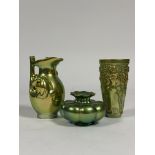 Zsolnay Pecs: a group in eosin gold/green glazes comprising a jug modelled with figures; a beaker-