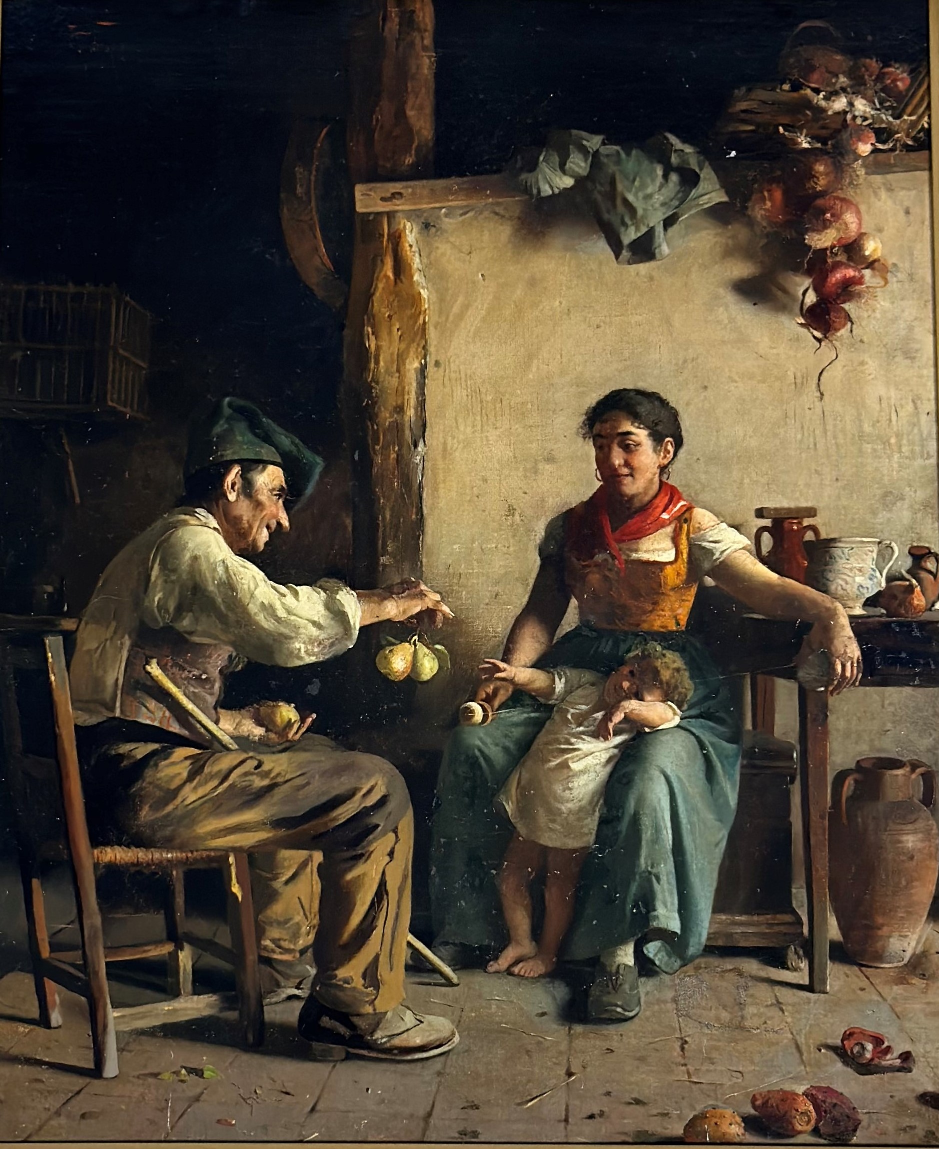 Italian School, late 19th century, A Family in a Rustic Interior, indistinctly signed upper left,