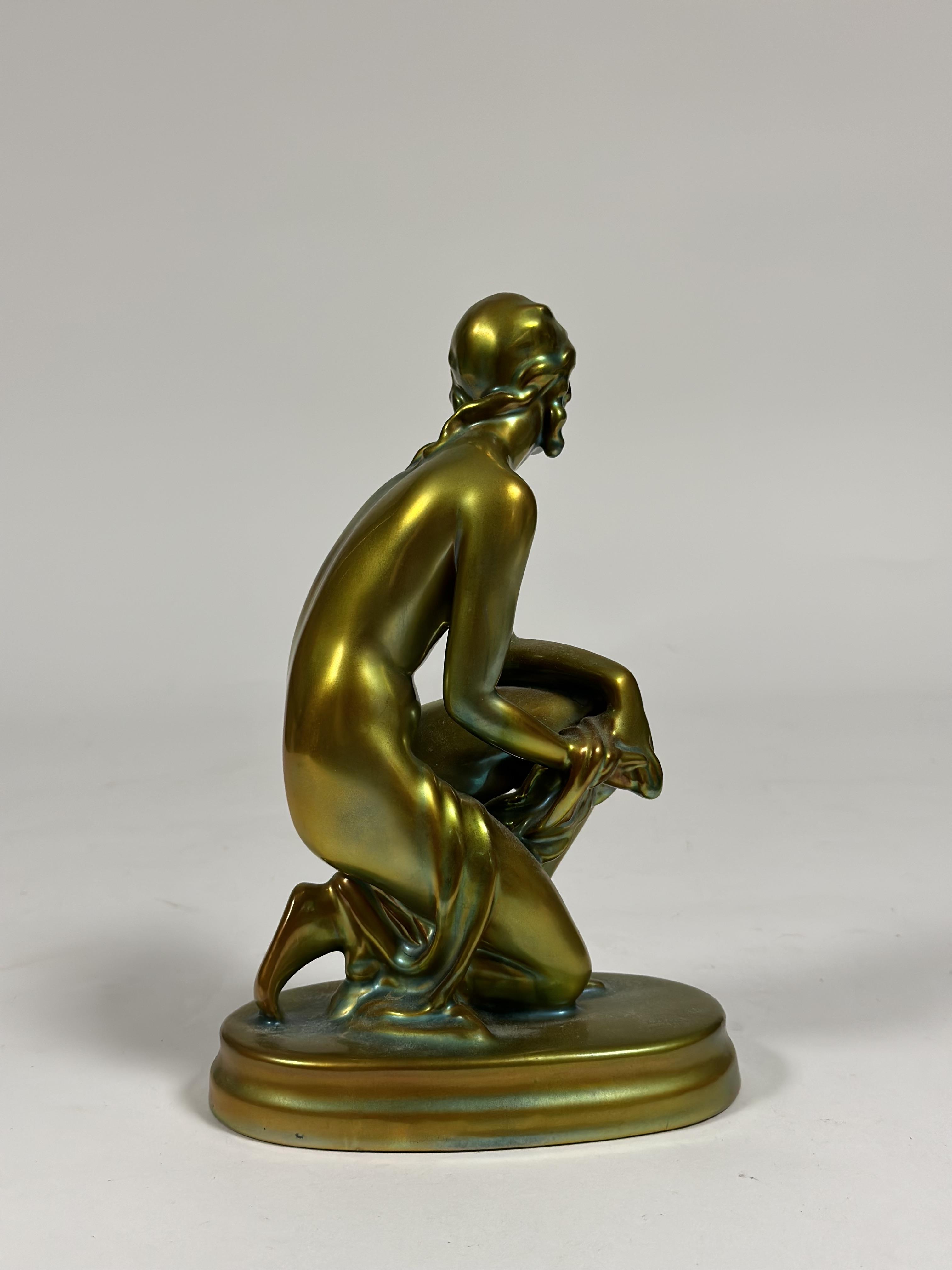 Zsolnay Pecs: a figure of a kneeling female nude, in an eosin green/gold glaze, printed mark. Height - Image 2 of 2