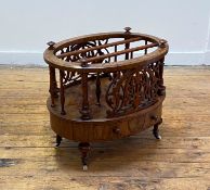 A Victorian figured walnut and rosewood two division music Canterbury of oval outline, with a