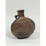 A terracotta vessel or amphora, possibly late Roman North Africa, of ovoid form, with single