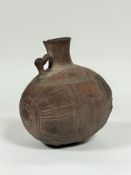 A terracotta vessel or amphora, possibly late Roman North Africa, of ovoid form, with single