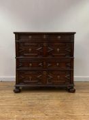 An oak two part chest of drawers, circa 1700 and later, the rectangular top with moulded edge over