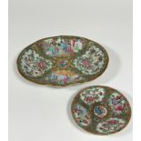 A 19th century Chinese Canton famille rose dish, of shaped oval form, painted with alternating