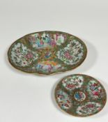 A 19th century Chinese Canton famille rose dish, of shaped oval form, painted with alternating