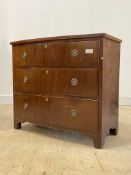 A 19th century bow front chest, fitted with three graduated drawers, raised on bracket supports