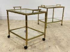 A pair of mid to late 20th century brass faux bamboo drinks trolleys, each with lift off tray top