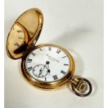 A gilt metal full Hunter pocket watch with circular enamelled dial with subsidiaries dial and roman