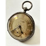 An Edwardian Chester silver open faced pocket watch retailed by John Forrest, London with silver