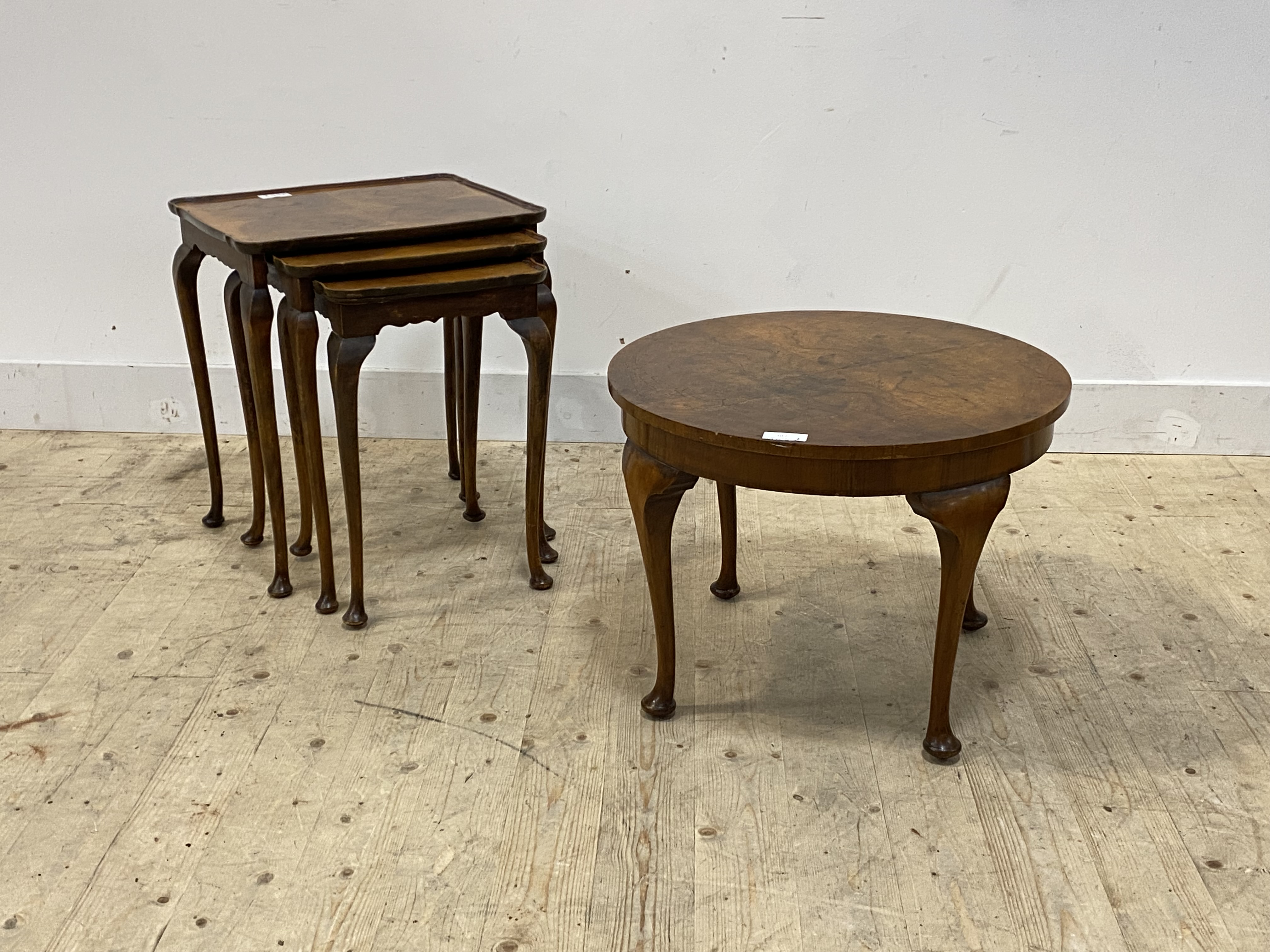 An early 20th century walnut circular low table on cabriole supports (D60cm) together with a similar