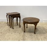 An early 20th century walnut circular low table on cabriole supports (D60cm) together with a similar