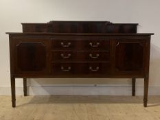 A Georgian style reproduction mahogany sideboard with ledge back, three centre drawers and two