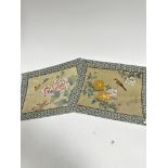 A pair of Chinese paintings on silk with butterflies and chaffinch, enclosed within fabric mounted