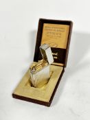 A S.T. Dupont, Paris plated rectangular cigarette lighter, with textured finish, with hinged top