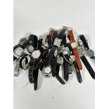 A large collection of lady's and gentleman's quartz wristwatches etc. and three straps (a lot)