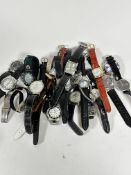 A large collection of lady's and gentleman's quartz wristwatches etc. and three straps (a lot)