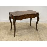 A kingwood bureau plat in the Louis XV taste, first half of the 20th century, of serpentine outline,