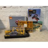 A B&Q 450 watt diamond wheel tile cutter, together with B&Q jumper cables, a cordless multi sander