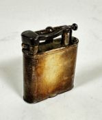 A Dunhill silver engine turned cigarette lighter (5cm x 4cm), stamped AD and London 1951 (66.2g)