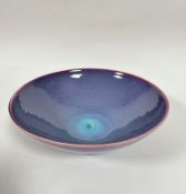 A modern Chinese bowl with lavender with underlying blue turquoise central glaze to inner surface,