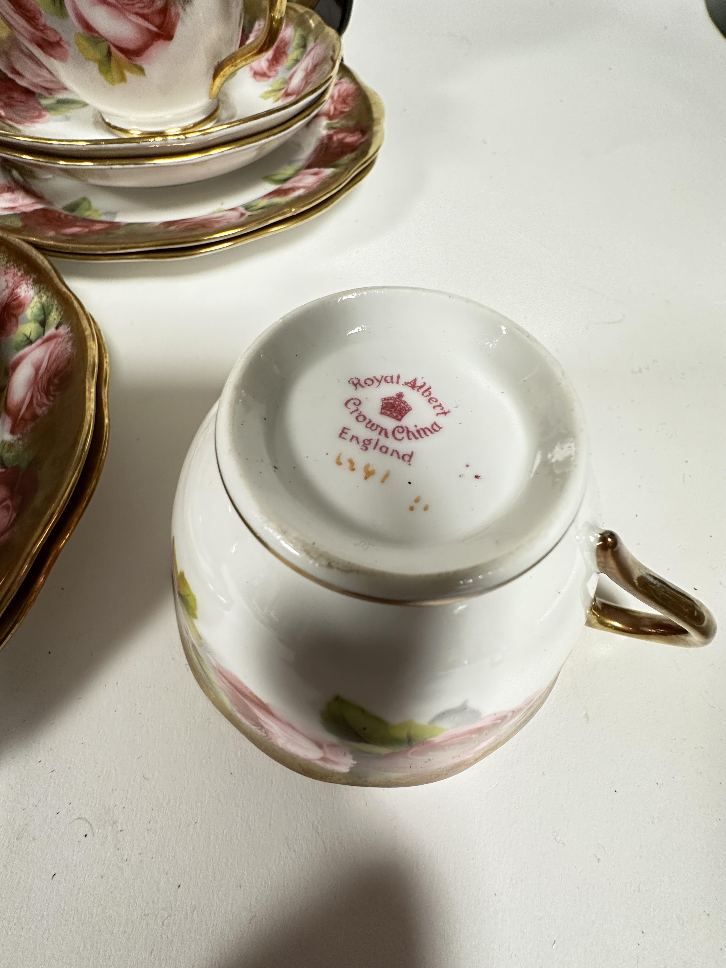 A Royal Albert pink rose and gilt bordered teaset of thirty nine pieces, including two cake - Image 3 of 9
