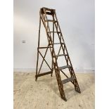 An early 20th century pine six rung decorators step ladder, H200cm