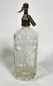 A Cantrell & Cochran moulded glass siphon complete with top, shows no signs of damage, chips or