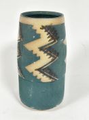 Moray Miller, Scottish, a pottery cylinder tapered vase with characteristic stylised geometric