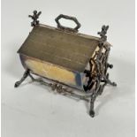 A rustic style biscuit box with pitched thatched style cover and handle to top and rustic