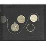 A box glazed frame containing a white metal Cyma open faced pocket watch, taken to pieces,