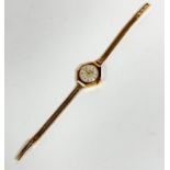 A lady's Helvetica super shock resistant 9ct gold wrist watch on 9ct gold flexible link bracelet,