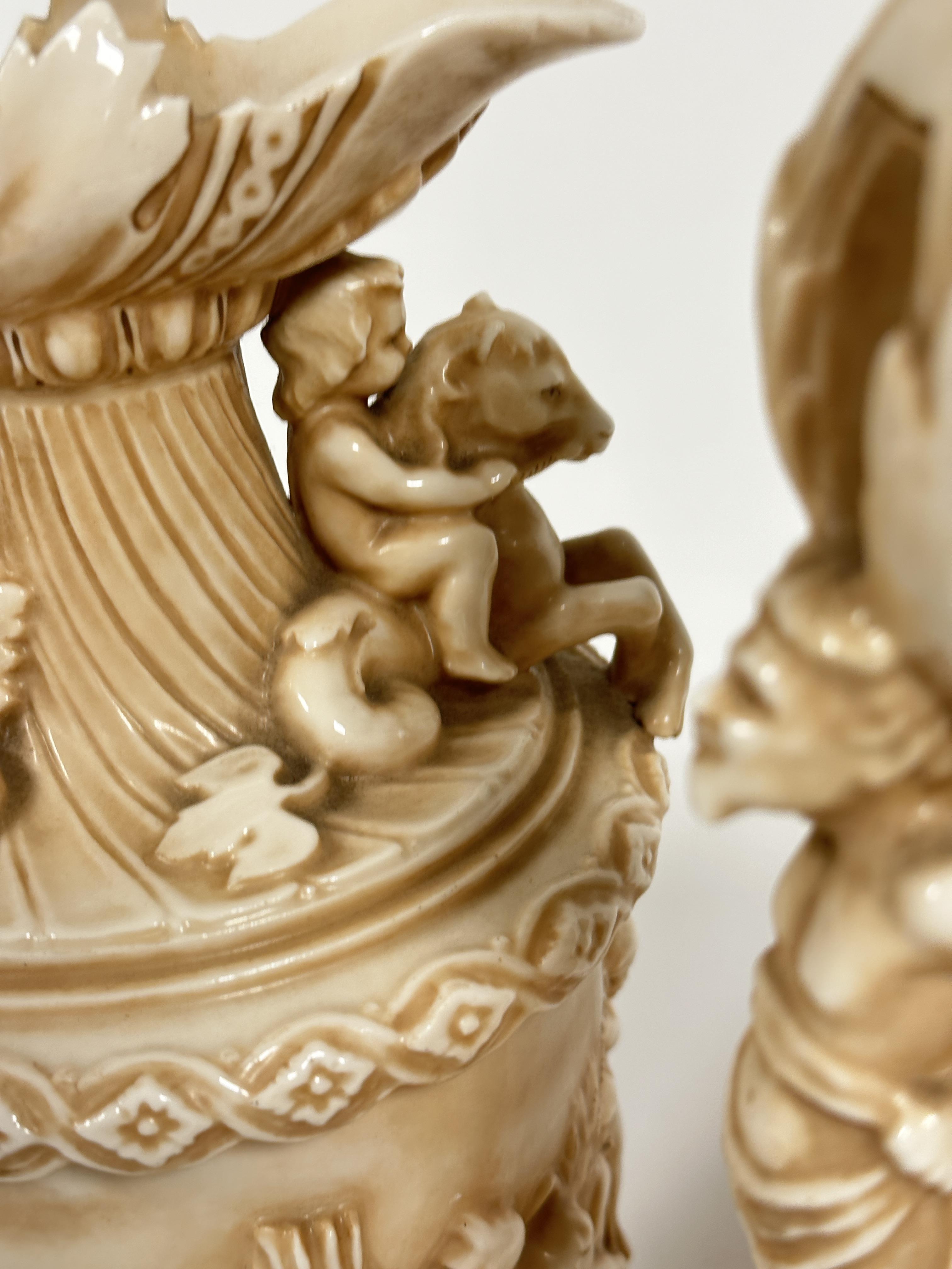 A pair of late 19thc Rudolstadt Straus & Sohne ewers, the handles mounted with cherubs with mask - Image 9 of 12